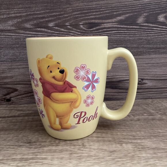 Disney Store Exclusive Winnie the Pooh Mug Large Butter Yellow Pink Flowers - Picture 1 of 7